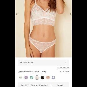 Pink and white lace thong